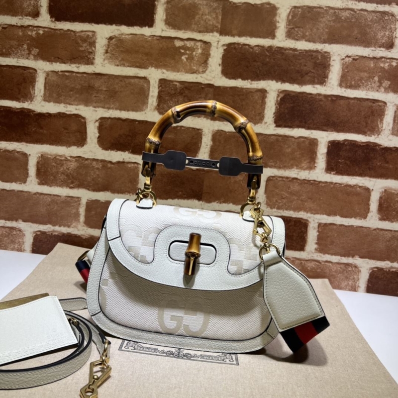 G*u*i top handle bags